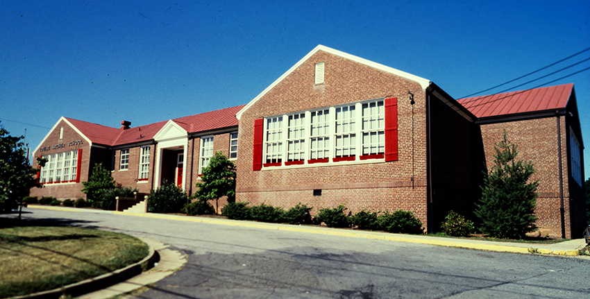 Color photograph of the front of Louise Archer Elementary School.